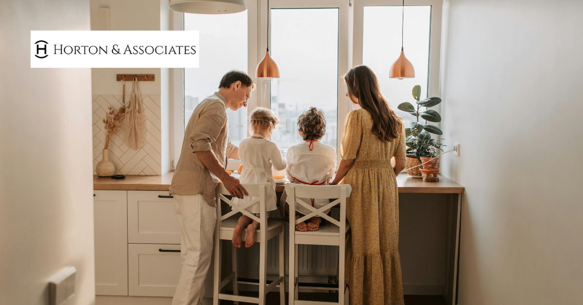 Family of four spending time together at home in Evergreen